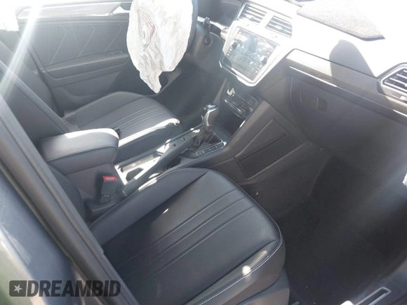 2024 Volkswagen Tiguan SE R-Line Black with VIN 3VVCB7AX2RM114556, listed as a IAAI auction lot 41887373 with 7,013 mi miles and . Bid and sale history available at DreamBid. Image 5.
