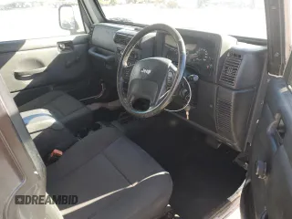 2006 Jeep Wrangler Sport Right Hand Drive with VIN 1J4F449S26P741397, listed as a Copart auction lot 41656585 with 205,683 mi miles and Clean Title. Bid and sale history available at carsss.com. Image 8.