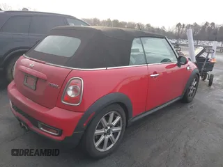 2012 MINI Convertible S with VIN WMWZP3C5XCT249627, listed as a IAAI auction lot 41430331 with 157,533 mi miles and . Bid and sale history available at DreamBid. Image 4.