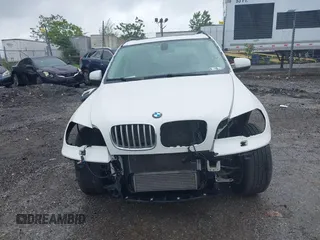 2013 BMW X5 xDrive35i z VIN 5UXZV4C53D0E14968, wystawiony jako IAAI lot #42253469 z przebiegiem 53 562 mil mil oraz . Historia ofert i sprzedaży dostępna na DreamBid. Obrazek 13.