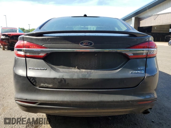 2018 Ford Fusion SE z VIN 3FA6P0LU9JR242443, wystawiony jako Copart lot #58049355 z przebiegiem 123 990 mil mil oraz Szkoda całkowita • Salvage title. Historia ofert i sprzedaży dostępna na DreamBid. Obrazek 6.