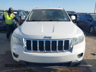 2011 Jeep Grand Cherokee Laredo with VIN 1J4RR4GG4BC703071, listed as a IAAI auction lot 41992878 with 126,199 mi miles and . Bid and sale history available at DreamBid. Image 12.