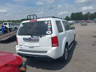 2014 Honda Pilot EX-L with VIN 5FNYF3H50EB005811, listed as a IAAI auction lot 42115804 with 216,033 mi miles and . Bid and sale history available at DreamBid. Image 16.