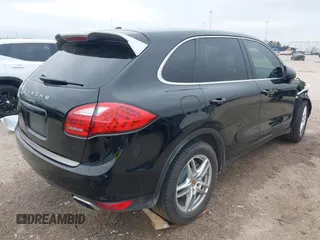 2014 Porsche Cayenne with VIN WP1AA2A21ELA92673, listed as a IAAI auction lot 41597732 with 140,673 mi miles and . Bid and sale history available at DreamBid. Image 4.