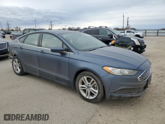 2018 Ford Fusion SE with VIN 3FA6P0HD9JR176808, listed as a Copart auction lot 48559725 with 106,874 mi miles and Salvage Title. Bid and sale history available at DreamBid. Image 4.