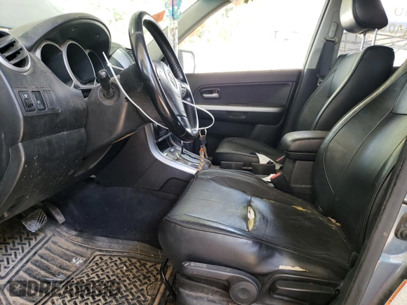 2006 Suzuki Grand Vitara Luxury with VIN JS3TD947X64101689, listed as a Copart auction lot 72993304 with 249,472 mi miles and Salvage title. Bid and sale history available at DreamBid. Image 7.