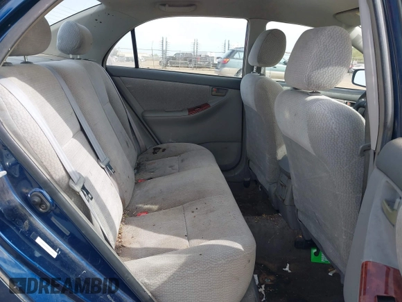 2004 Toyota Corolla CE with VIN JTDBR38E042034109, listed as a IAAI auction lot 42054614 with 162,116 mi miles. Bid and sale history available at carsss.com. Image 8.