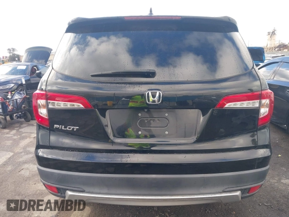 2019 Honda Pilot EX-L with VIN 5FNYF5H51KB013763, listed as a IAAI auction lot 41711089 with 79,651 mi miles and . Bid and sale history available at DreamBid. Image 16.