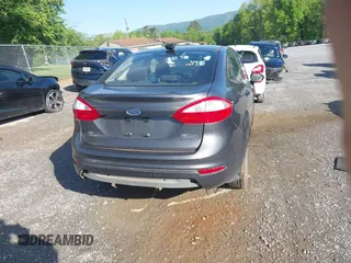 2016 Ford Fiesta SE z VIN 3FADP4BJ8GM184675, wystawiony jako IAAI lot #42169234 z przebiegiem 54 231 mil mil oraz . Historia ofert i sprzedaży dostępna na DreamBid. Obrazek 17.