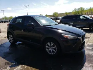 2016 Mazda CX-3 Sport z VIN JM1DKBB72G0106476, wystawiony jako Copart lot #56236245 z przebiegiem 161 207 mil mil oraz Szkody całkowita. Historia ofert i sprzedaży dostępna na DreamBid. Obrazek 13.