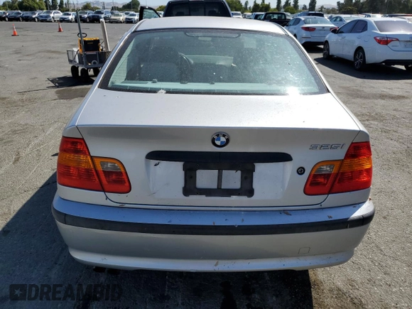 2003 BMW 3 Series 325i with VIN WBAEV33423KL85476, listed as a Copart auction lot 62429495 with 153,960 mi miles and Clean title. Bid and sale history available at DreamBid. Image 6.