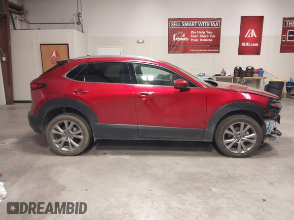 2021 Mazda CX-30 Premium with VIN 3MVDMADL8MM320149, listed as a IAAI auction lot 41317680 with 47,383 mi miles and . Bid and sale history available at DreamBid. Image 14.