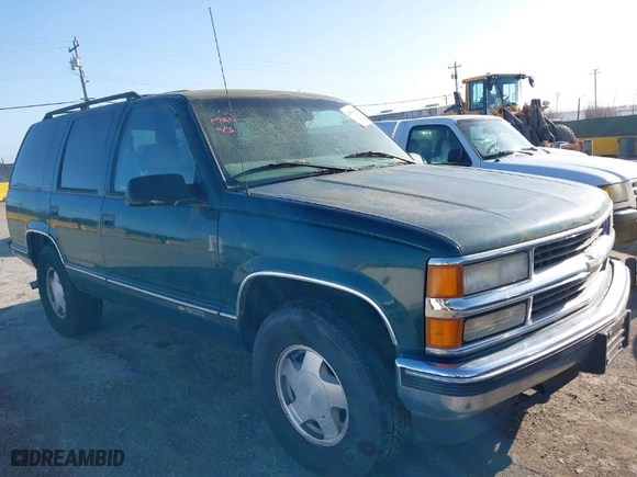 1997 Chevrolet Tahoe with VIN 1GNEK13RXVJ375189, listed as a IAAI auction lot 41959601 with 153,589 mi miles. Bid and sale history available at carsss.com. Image 1.
