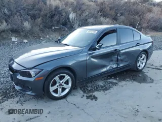 2015 BMW 3 Series 328i with VIN WBA3A5G5XFNS91835, listed as a Copart auction lot 88312495 with 65,615 mi miles and Salvage Title. Bid and sale history available at DreamBid. Image 1.