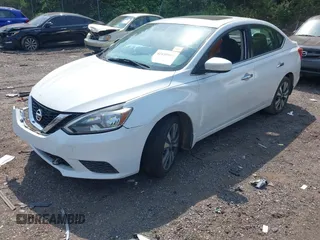 2019 Nissan Sentra S z VIN 3N1AB7AP8KY302151, wystawiony jako IAAI lot #42150965 z przebiegiem 138 486 mil mil oraz . Historia ofert i sprzedaży dostępna na DreamBid. Obrazek 16.