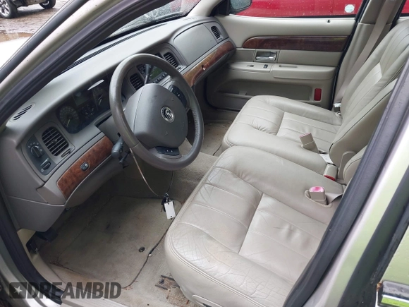 2010 Mercury Grand Marquis LS z VIN 2MEBM7FV5AX606629, wystawiony jako IAAI lot #42345444 z przebiegiem 66 600 mil mil oraz . Historia ofert i sprzedaży dostępna na DreamBid. Obrazek 5.