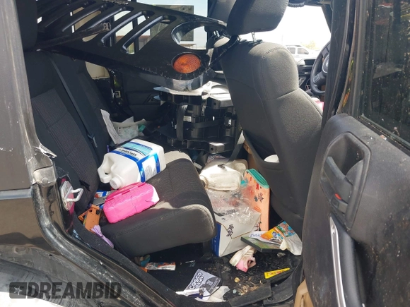 2011 Jeep Wrangler Unlimited Rubicon with VIN 1J4BA6H15BL580301, listed as a IAAI auction lot 42673014 with Not provided miles and . Bid and sale history available at DreamBid. Image 8.