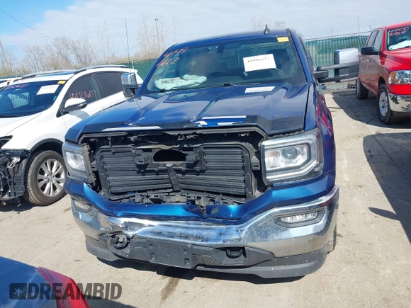 2019 GMC Sierra 1500 SLE z VIN 2GTV2MEC5K1102900, wystawiony jako IAAI lot #41996612 z przebiegiem 69 502 mil mil oraz . Historia ofert i sprzedaży dostępna na DreamBid. Obrazek 13.