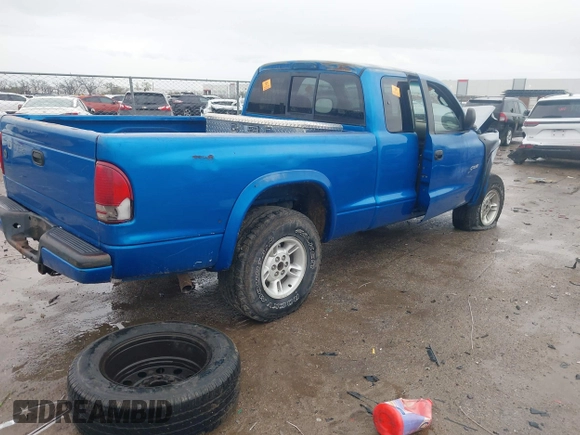 1998 Dodge Dakota SLT z VIN 1B7GG22YXWS683170, wystawiony jako IAAI lot #41903787 z przebiegiem Nie podano mil oraz . Historia ofert i sprzedaży dostępna na DreamBid. Obrazek 4.