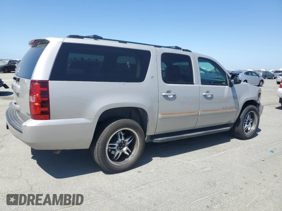 2007 Chevrolet Suburban LTZ с VIN 1GNFK16357J236974, выставлен на аукционе Copart как лот 58245615 с пробегом 224 755 миль миль и Списание • Salvage title. История ставок и продаж доступна на DreamBid. Изображение 3.