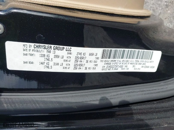 2013 Dodge Grand Caravan SXT with VIN 2C4RDGCG7DR714569, listed as a IAAI auction lot 41945365 with 134,002 mi miles. Bid and sale history available at carsss.com. Image 9.