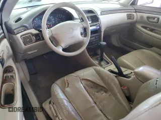 1999 Toyota Solara SE z VIN 2T1CF22P4XC171139, wystawiony jako Copart lot #58728195 z przebiegiem 148 703 mil mil oraz Szkody całkowita. Historia ofert i sprzedaży dostępna na DreamBid. Obrazek 8.