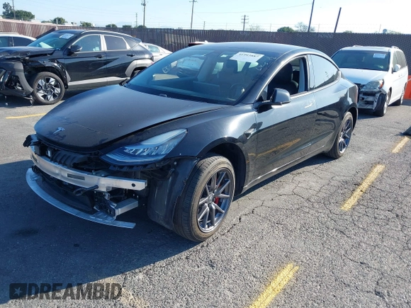 2018 Tesla Model 3 Long Range Battery with VIN 5YJ3E1EA5JF171948, listed as a IAAI auction lot 41993887 with 42,370 mi miles and . Bid and sale history available at DreamBid. Image 2.