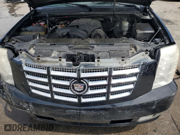 2008 Cadillac Escalade z VIN 1GYFK63888R152005, wystawiony jako Copart lot #54179325 z przebiegiem 208 059 mil mil oraz Szkody całkowita. Historia ofert i sprzedaży dostępna na DreamBid. Obrazek 12.
