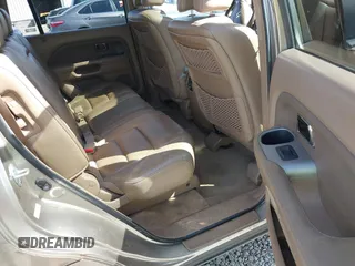 2006 Honda Pilot EX-L with VIN 2HKYF18566H561371, listed as a IAAI auction lot 41950296 with 145,579 mi miles and . Bid and sale history available at DreamBid. Image 8.