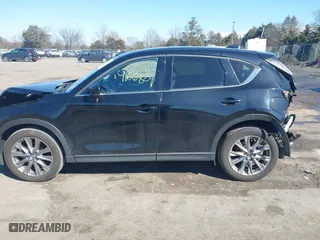 2019 Mazda CX-5 Grand Touring with VIN JM3KFBDM2K0603297, listed as a IAAI auction lot 41668241 with 54,583 mi miles. Bid and sale history available at carsss.com. Image 14.