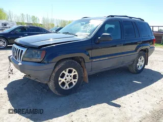 1999 Jeep Grand Cherokee Laredo with VIN 1J4GW58S8XC524502, listed as a IAAI auction lot 42193506 with 147,920 mi miles and . Bid and sale history available at DreamBid. Image 2.
