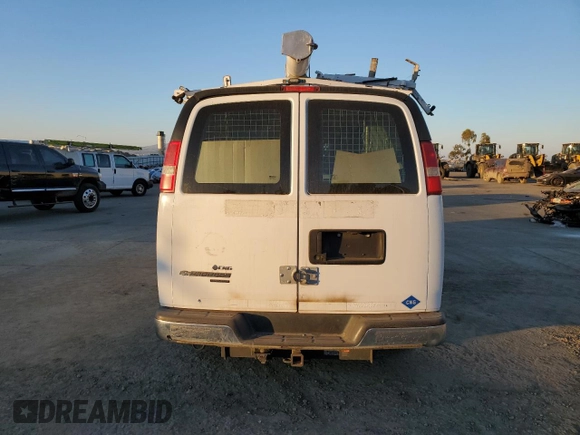 2014 Chevrolet Express Cargo z VIN 1GCWGFCB0E1122350, wystawiony jako Copart lot #58278045 z przebiegiem 99 593 mil mil oraz Czysty tytuł • Clean title. Historia ofert i sprzedaży dostępna na DreamBid. Obrazek 6.