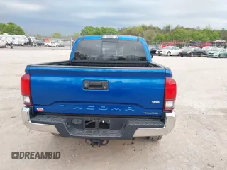 2018 Toyota Tacoma SR5 with VIN 3TMAZ5CNXJM069212, listed as a IAAI auction lot 42010564 with 73,825 mi miles and . Bid and sale history available at DreamBid. Image 16.