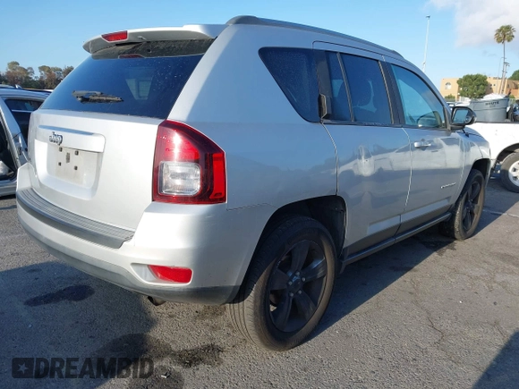 2014 Jeep Compass Sport with VIN 1C4NJDBB4ED567515, listed as a IAAI auction lot 42138801 with 183,673 mi miles. Bid and sale history available at carsss.com. Image 4.