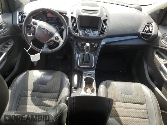 2013 Ford Escape Titanium z VIN 1FMCU0J94DUB90197, wystawiony jako Copart lot #59289925 z przebiegiem 200 006 mil mil oraz Czysty tytuł • Clean title. Historia ofert i sprzedaży dostępna na DreamBid. Obrazek 8.