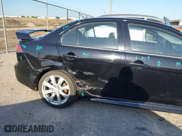 2014 Mitsubishi Lancer Ralliart with VIN JA32V6FVXEU005172, listed as a IAAI auction lot 41983895 with 70,584 mi miles and . Bid and sale history available at DreamBid. Image 6.