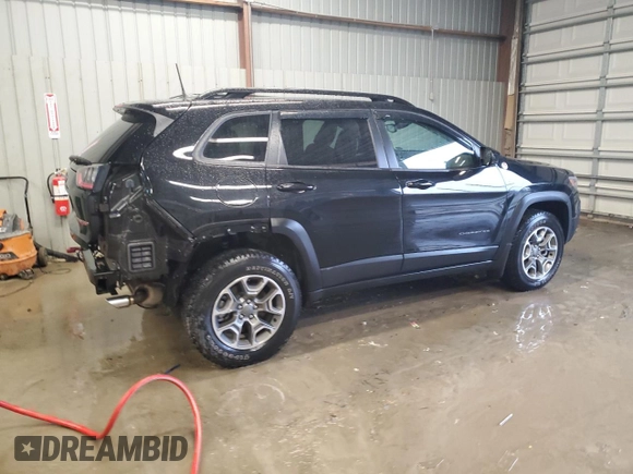 2022 Jeep Cherokee Trailhawk with VIN 1C4PJMBX3ND542576, listed as a Copart auction lot 85100224 with 18,911 mi miles and Salvage Title. Bid and sale history available at carsss.com. Image 3.