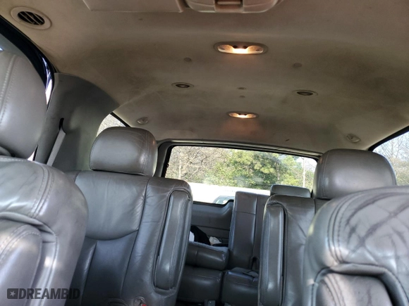 2004 GMC Yukon Denali with VIN 1GKEK63U74J212674, listed as a Copart auction lot 69704734 with 174,893 mi miles and Salvage Title. Bid and sale history available at carsss.com. Image 10.
