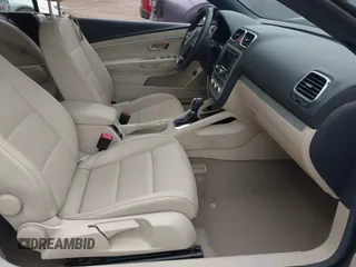 2014 Volkswagen Eos Komfort with VIN WVWBW8AH2EV001719, listed as a IAAI auction lot 42080290 with 105,661 mi miles and . Bid and sale history available at DreamBid. Image 5.