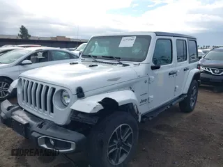 2023 Jeep Wrangler Sahara with VIN 1C4HJXEN7PW701607, listed as a IAAI auction lot 41774580 with 13,376 mi miles. Bid and sale history available at carsss.com. Image 6.