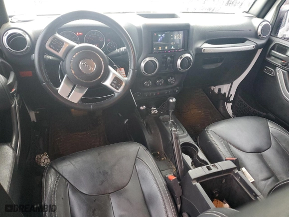 2015 Jeep Wrangler Unlimited Rubicon Hard Rock with VIN 1C4HJWFG8FL647910, listed as a Copart auction lot 46716605 with 48,139 mi miles and Salvage Title. Bid and sale history available at carsss.com. Image 8.