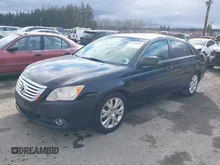 2010 Toyota Avalon XL with VIN 4T1BK3DB1AU356186, listed as a IAAI auction lot 41704838 with 150,462 mi miles and . Bid and sale history available at carsss.com. Image 18.