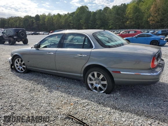 2006 Jaguar XJ with VIN SAJWA71B06SH03941, listed as a Copart auction lot 76013984 with 0 mi miles and Salvage Title. Bid and sale history available at carsss.com. Image 2.