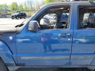 2010 Jeep Liberty Sport with VIN 1J4PN2GK1AW110261, listed as a Copart auction lot 54879855 with Not Provided miles and Salvage Title. Bid and sale history available at DreamBid. Image 7.