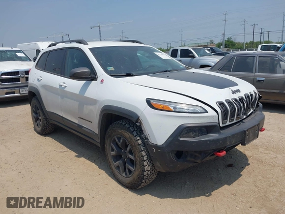 2015 Jeep Cherokee Trailhawk z VIN 1C4PJMBS5FW574102, wystawiony jako IAAI lot #42278805 z przebiegiem 164 250 mil mil oraz . Historia ofert i sprzedaży dostępna na DreamBid. Obrazek 1.