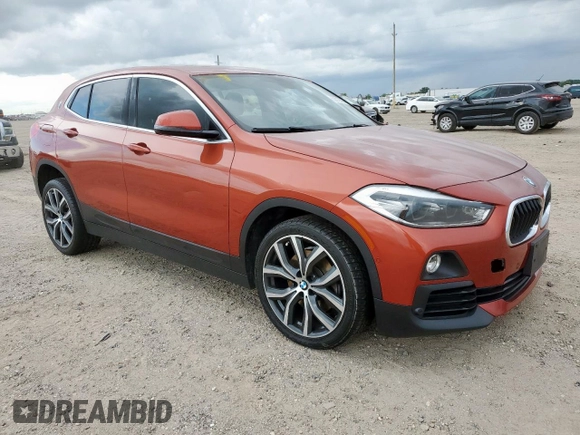2018 BMW X2 sDrive28i with VIN WBXYJ3C37JEJ75893, listed as a Copart auction lot 62513565 with 62,029 mi miles and Salvage title. Bid and sale history available at DreamBid. Image 4.