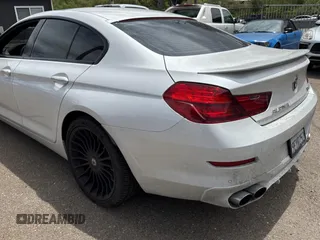 2015 BMW 6 Series 650i xDrive with VIN WBA6B4C57FD899926, listed as a Copart auction lot 54974505 with 63,570 mi miles and Salvage Title. Bid and sale history available at carsss.com. Image 3.