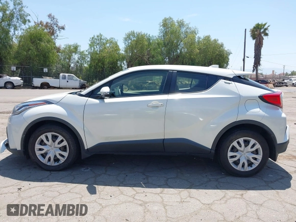 2020 Toyota C-HR LE with VIN JTNKHMBX3L1074882, listed as a IAAI auction lot 42064899 with 44,897 mi miles and . Bid and sale history available at DreamBid. Image 14.