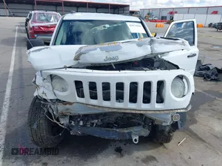 2014 Jeep Patriot Sport with VIN 1C4NJPBA9ED715277, listed as a IAAI auction lot 41674449 with 240,193 mi miles and . Bid and sale history available at carsss.com. Image 6.