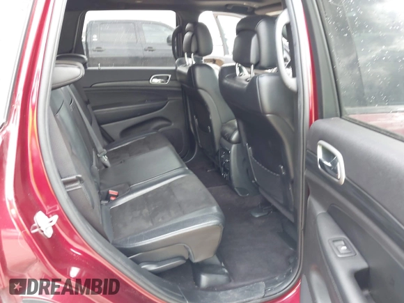 2019 Jeep Grand Cherokee Laredo E with VIN 1C4RJFAG1KC564325, listed as a IAAI auction lot 41359840 with 74,678 mi miles. Bid and sale history available at carsss.com. Image 8.